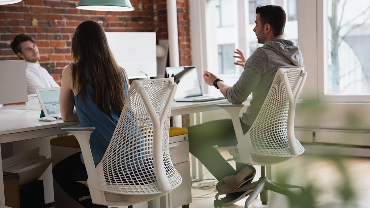 Nonprofit team collaborating in office