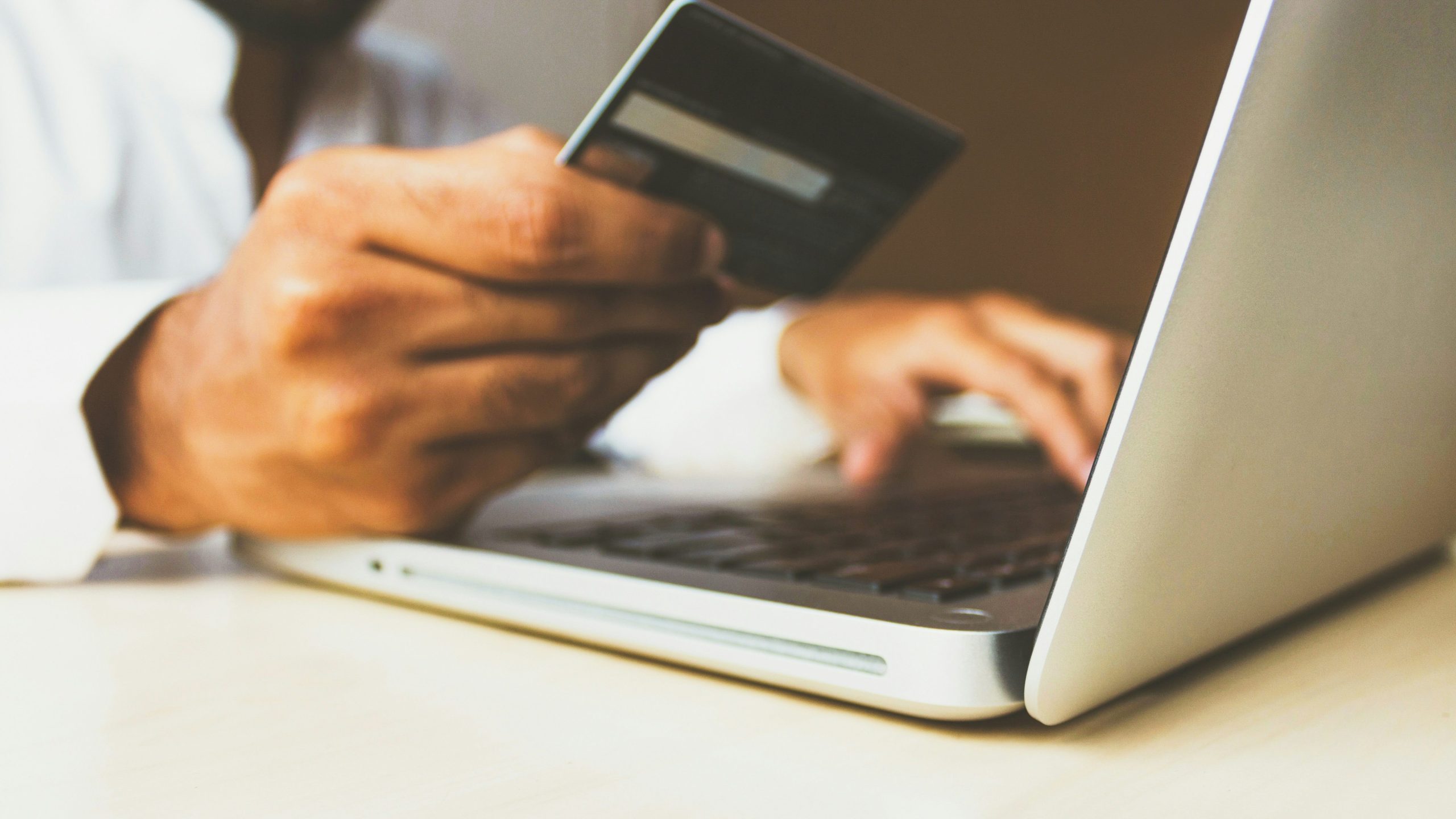 Person making a purchase for Christmas on computer.